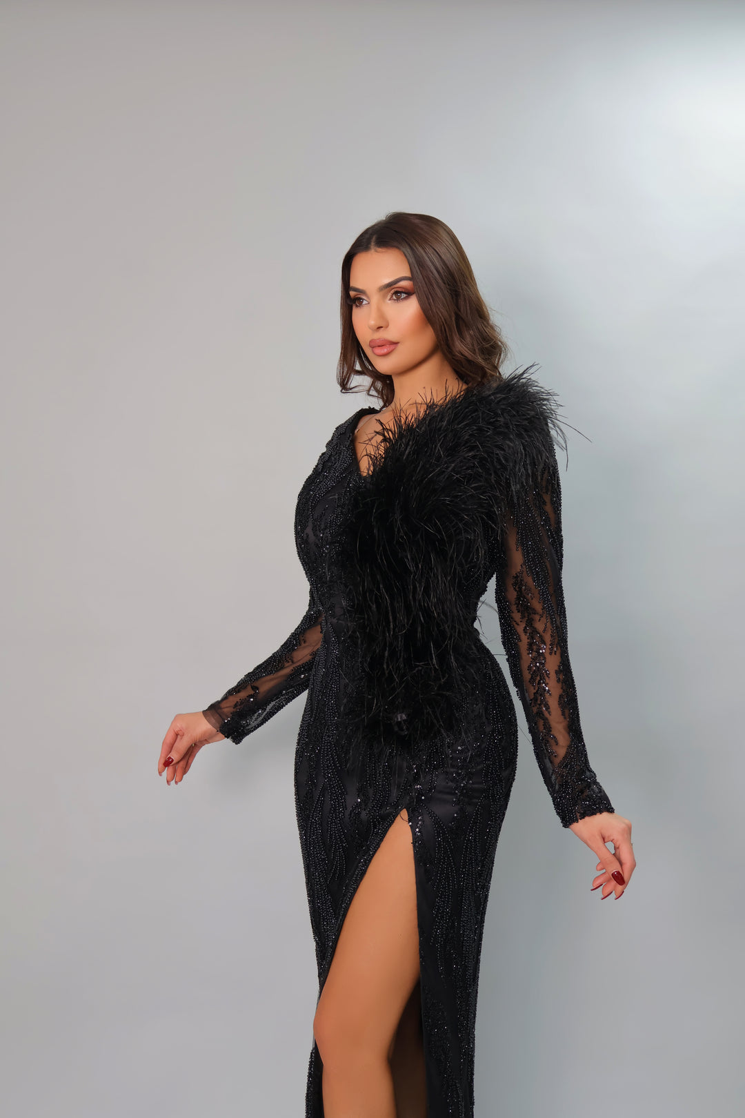 LONG SLEEVE BLACK EVENING GOWN WITH FEATHER DETAILS